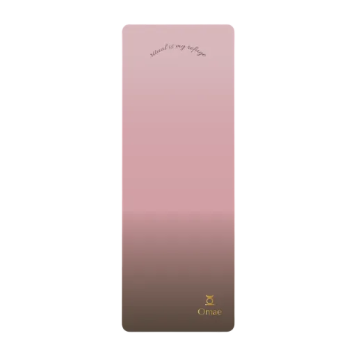 Pink and brown gradient yoga mat with 'Omae' branding on a light gray background